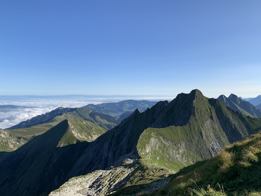 green mountains under blue sky during daytime