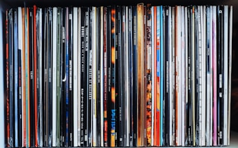 black wooden shelf with books