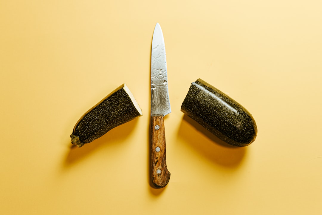 black and silver knife on white table