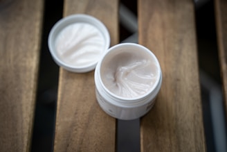 white plastic cup with white cream