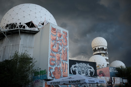 white dome building near trees during daytime in Teufelsberg Berlin Germany
