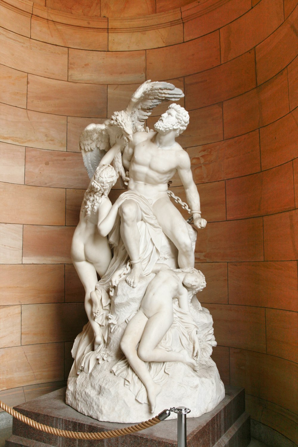 angel statue on brown wooden floor