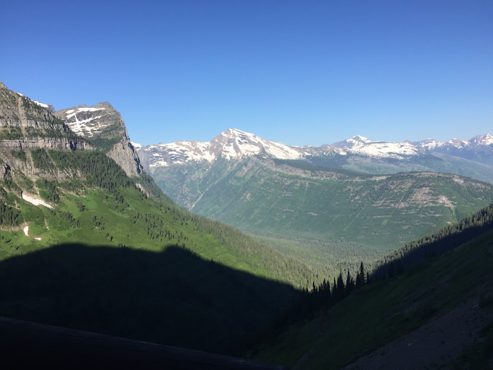 green and brown mountains under blue sky during daytime