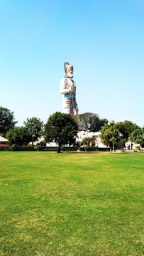A large outdoor sculpture in a serene park.