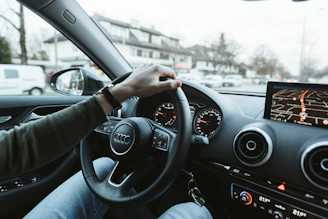person driving car during daytime