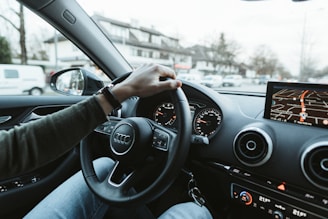 person driving car during daytime