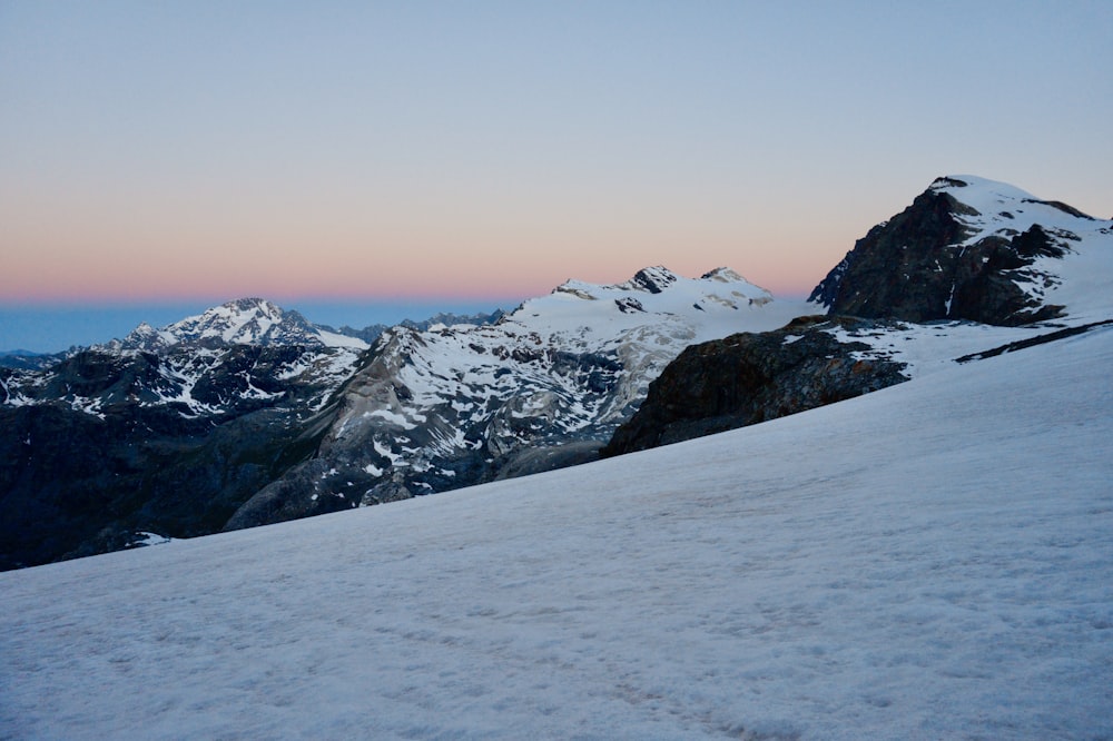 snow covered mountain during daytime