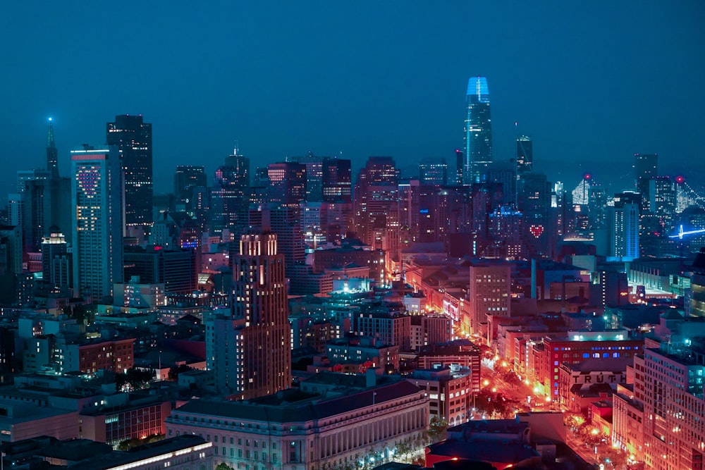 city skyline during night time