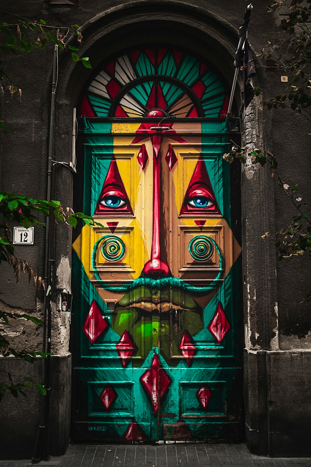 blue red and green wooden door