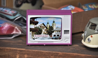 purple framed photo of green trees