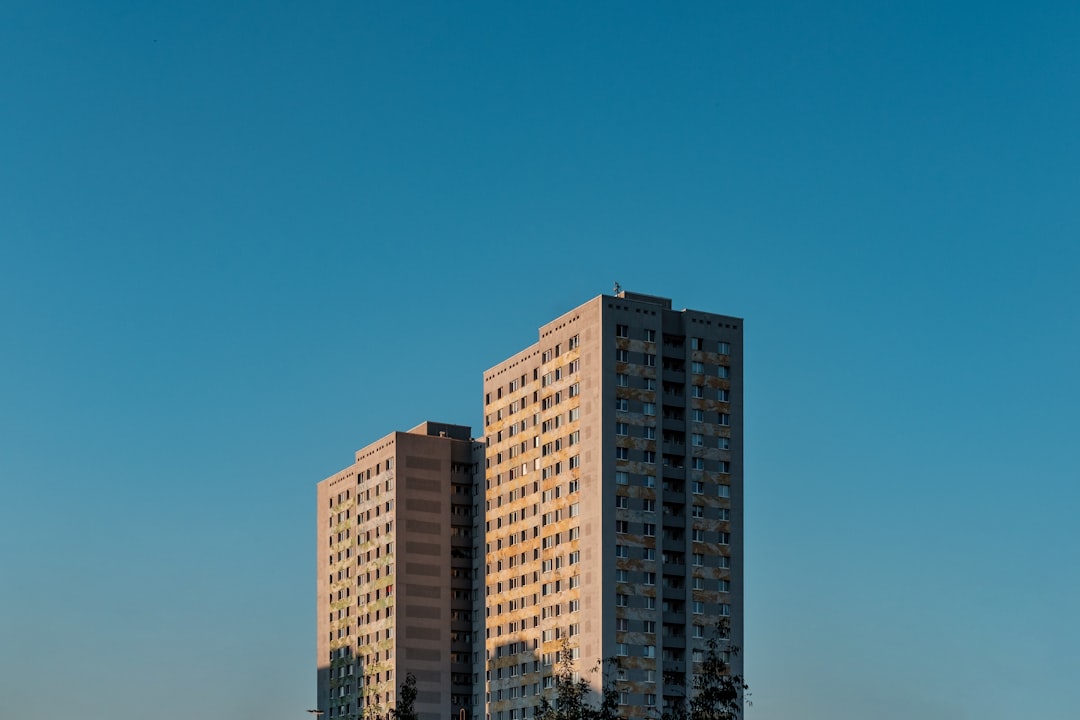 white and brown concrete building under blue sky during daytime