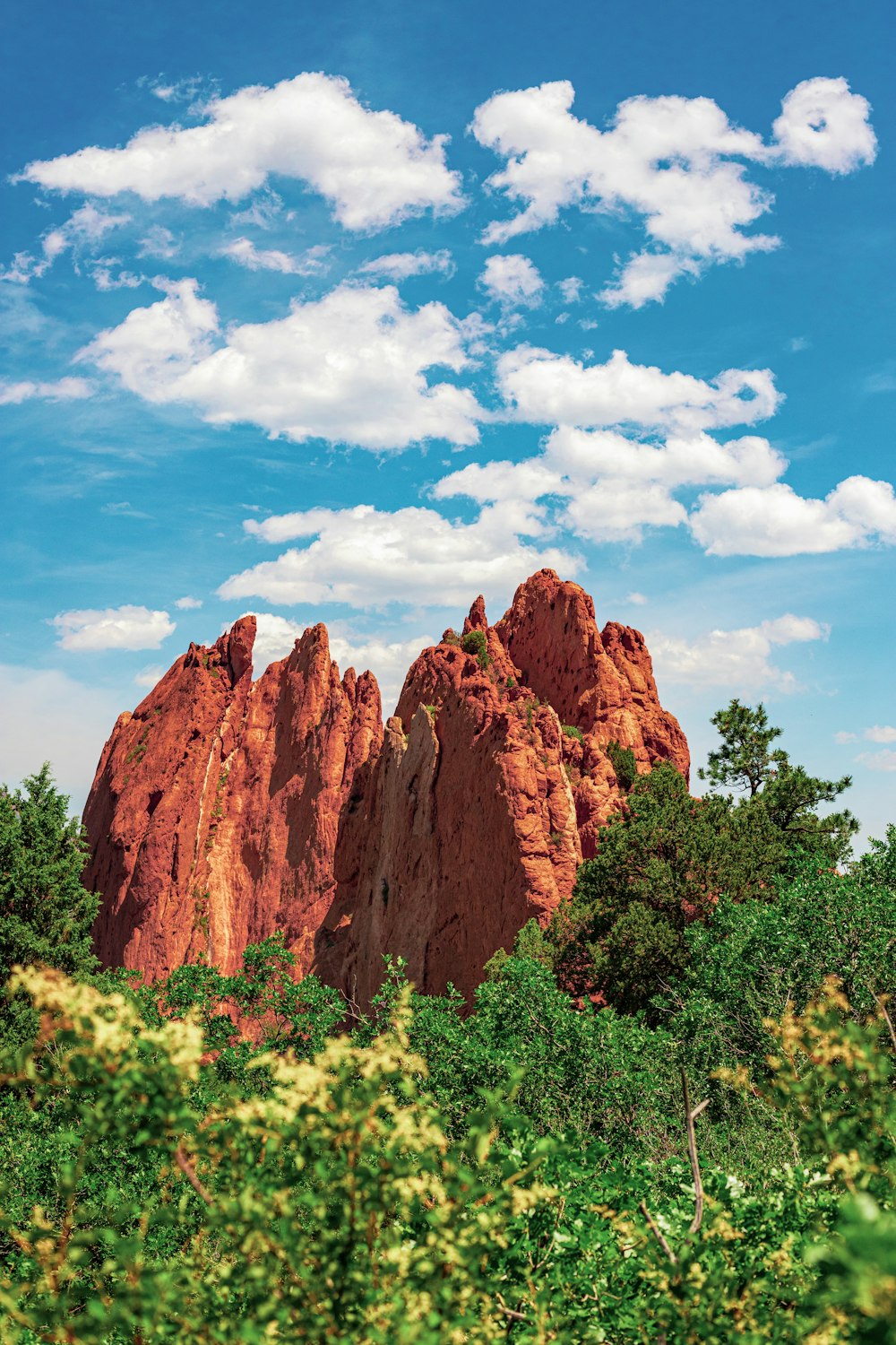 brown rock formation under blue sky during daytime