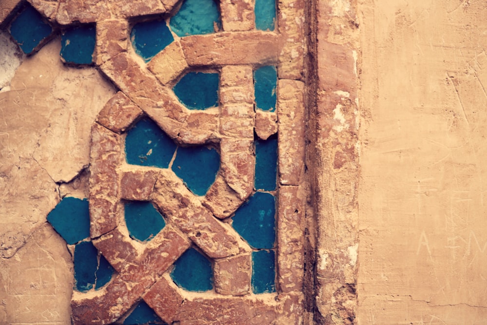 brown and white cross wall decor