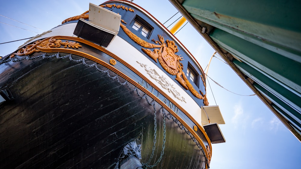 white and brown ship on water