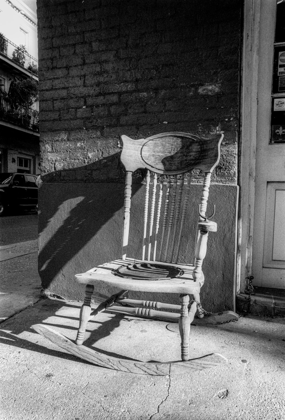 grayscale photo of wooden chair