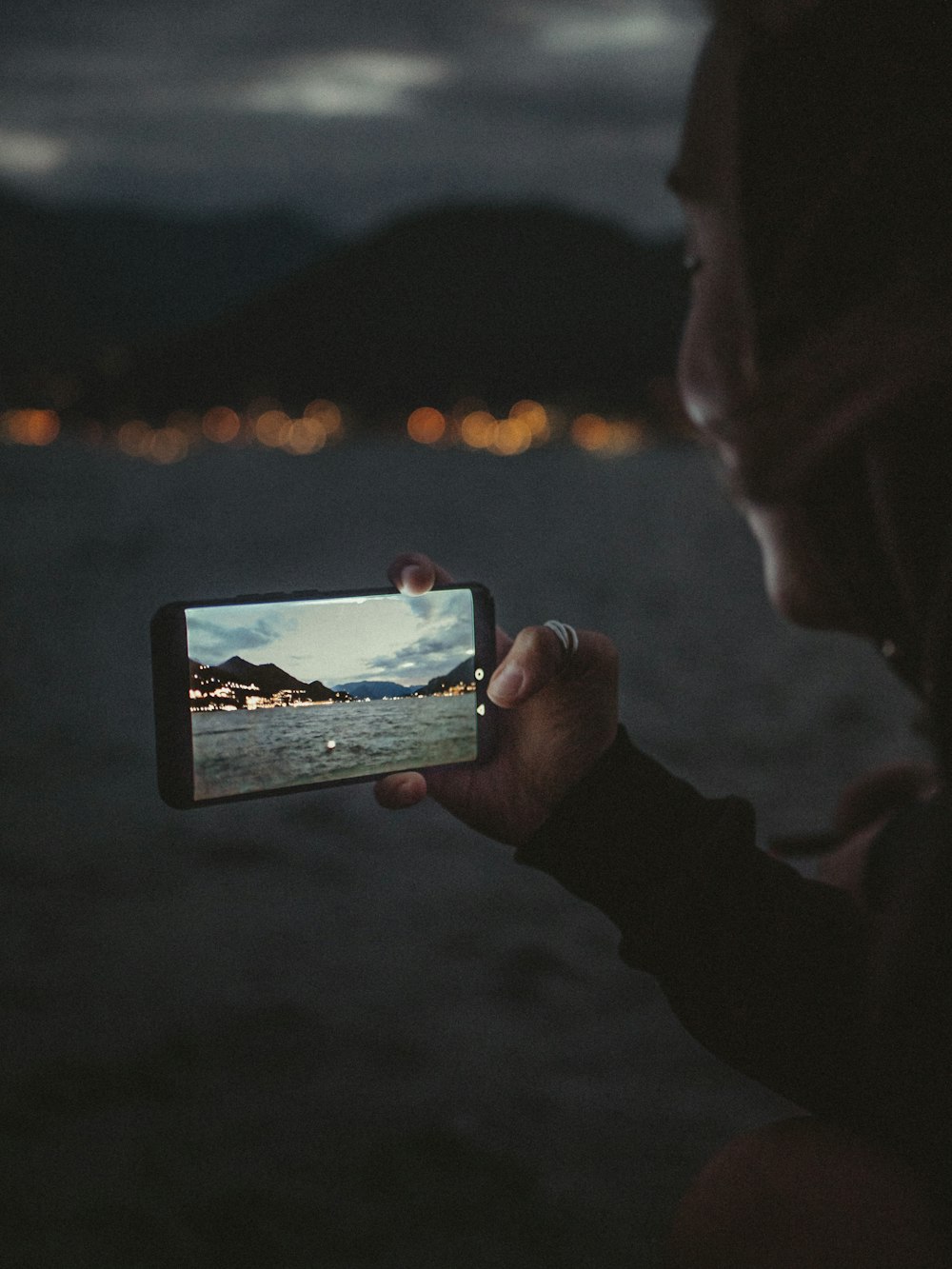 person holding black android smartphone