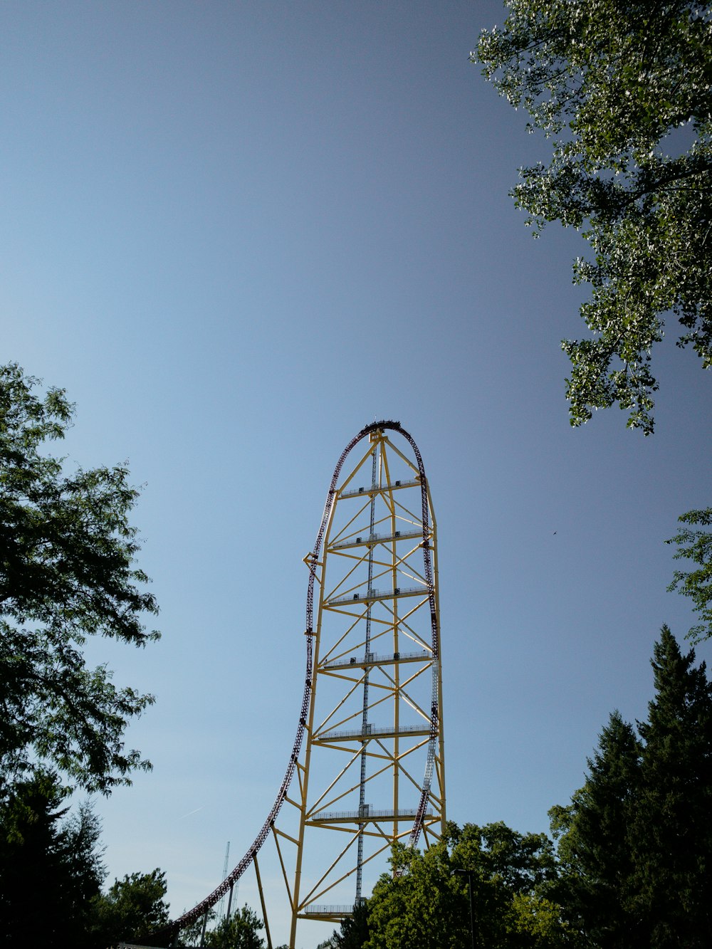 gray metal tower under gray sky