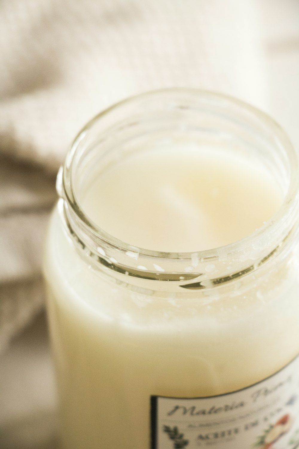 clear glass jar with white liquid