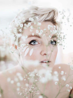 woman with blonde hair with water droplets