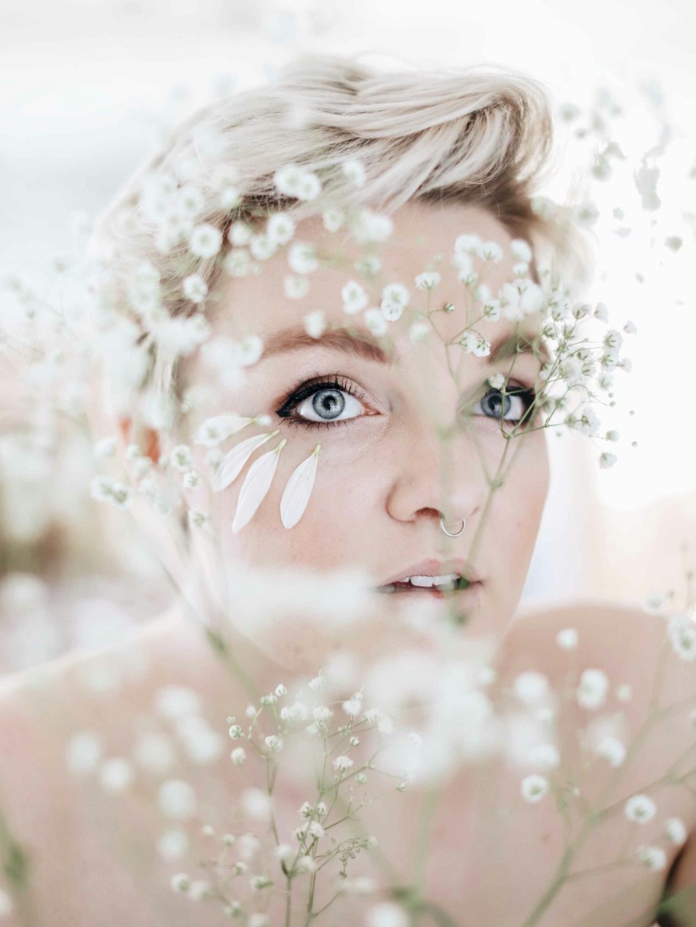 woman with blonde hair with water droplets