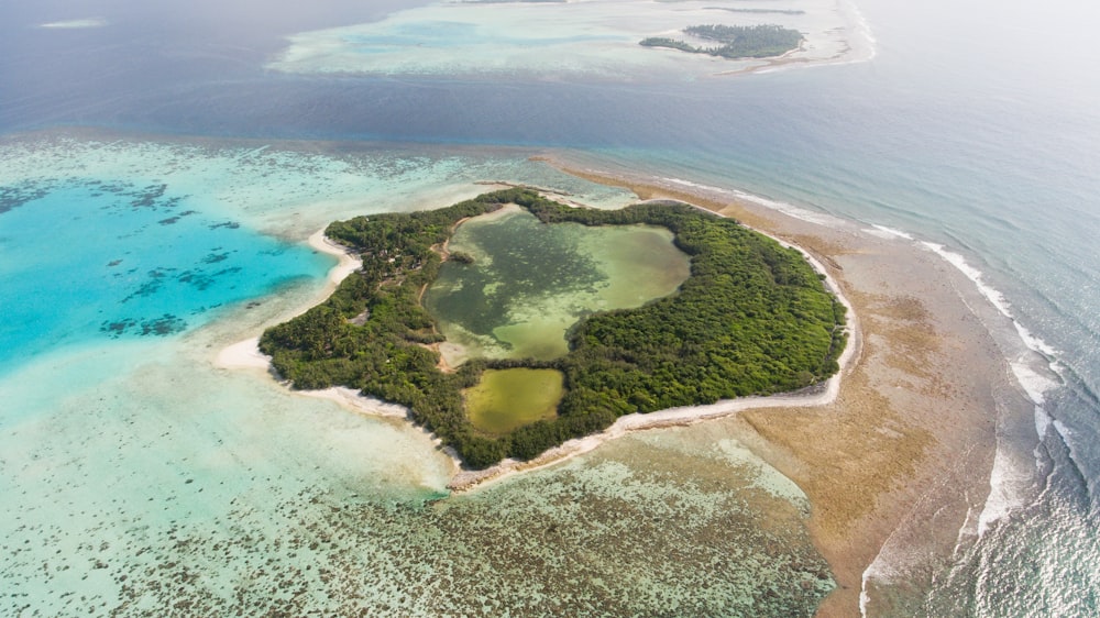 a heart shaped island in the middle of the ocean