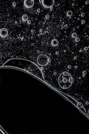 User interface mockup showing interactive bubbles expanding into sub-ideas on a clean background.