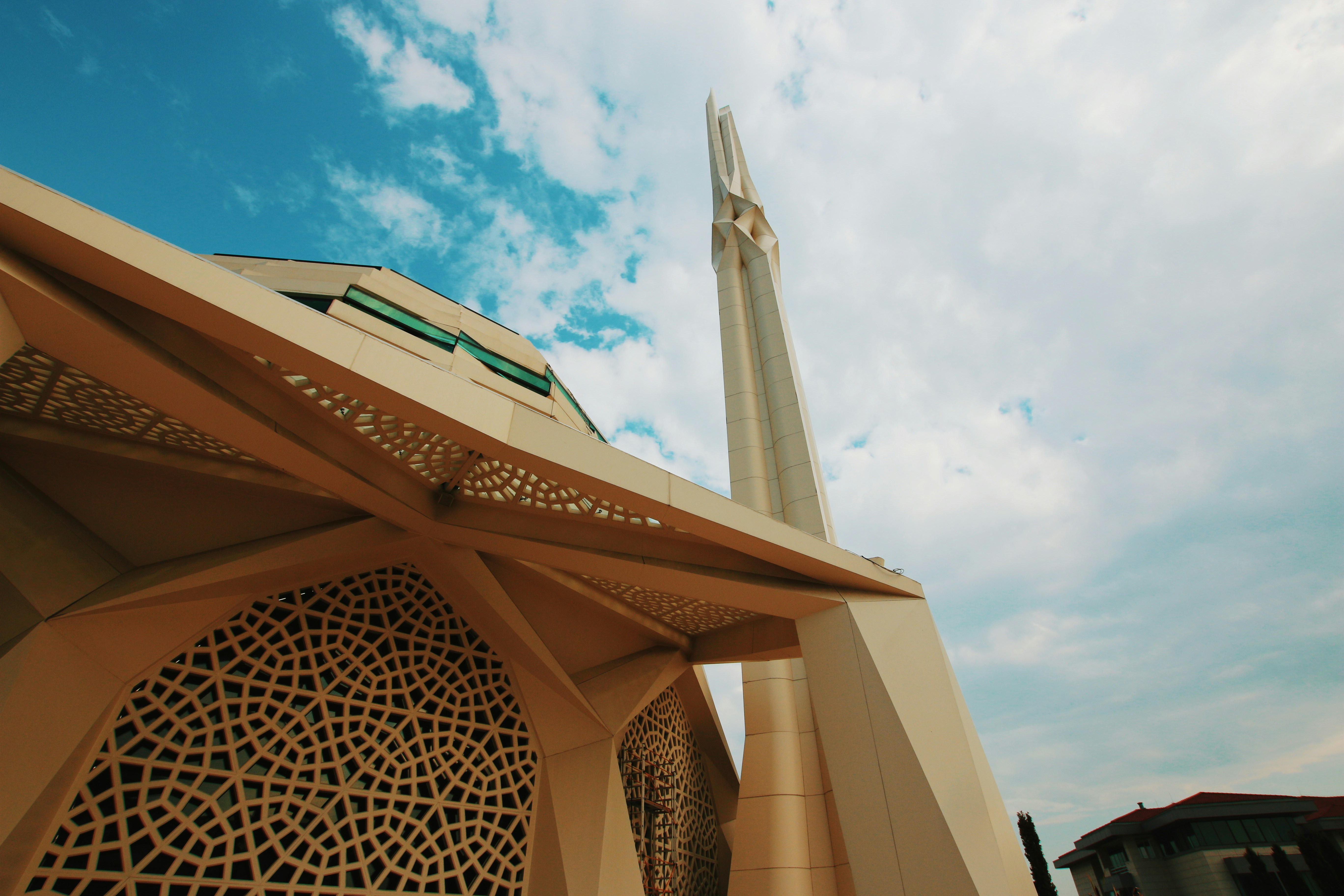white concrete building under blue sky during daytime