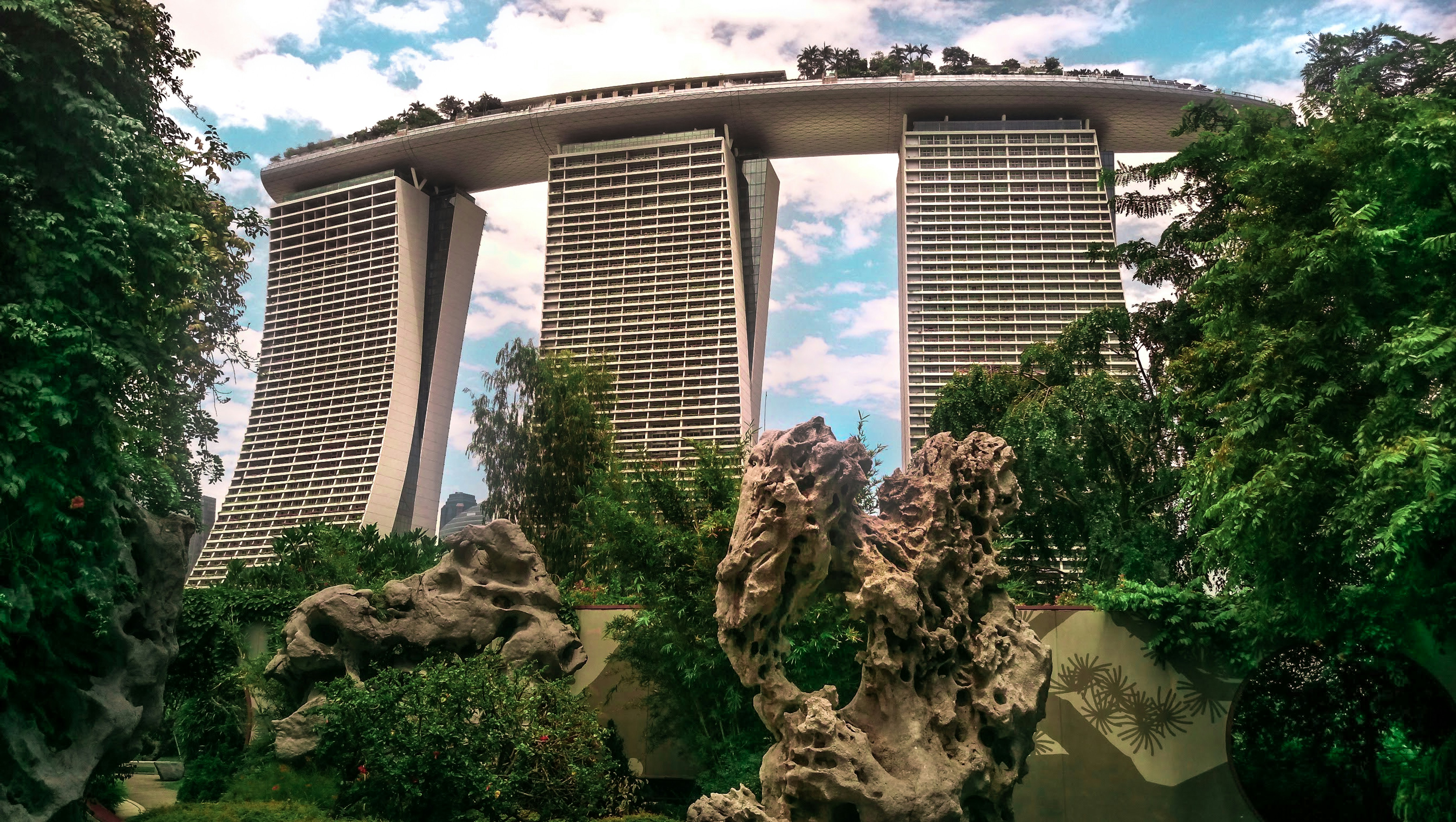 green trees near gray concrete building during daytime, One day I