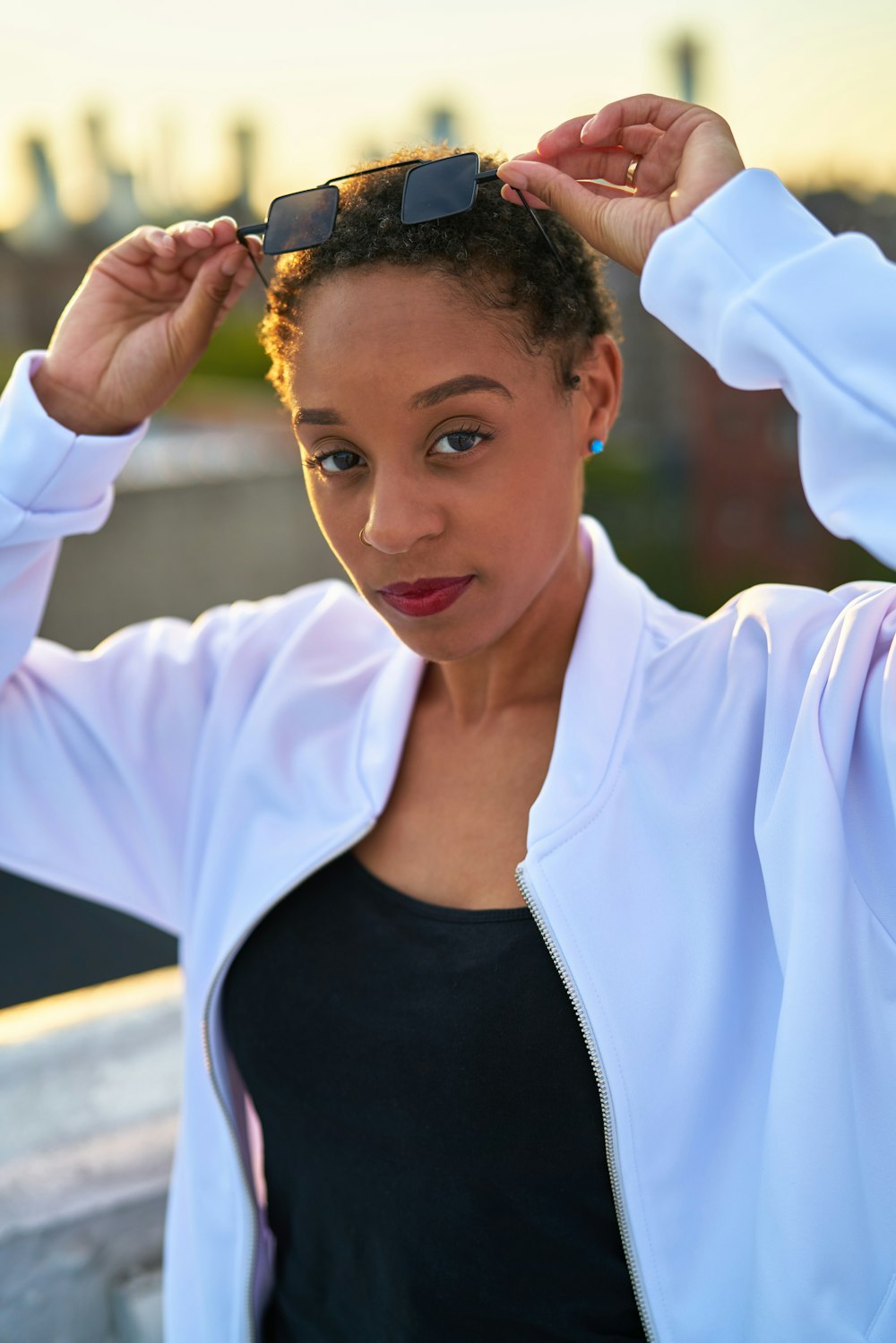 woman in white long sleeve shirt