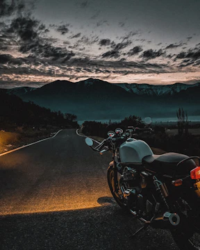 black and silver cruiser motorcycle on road during daytime