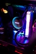 a close up of a computer with a neon light