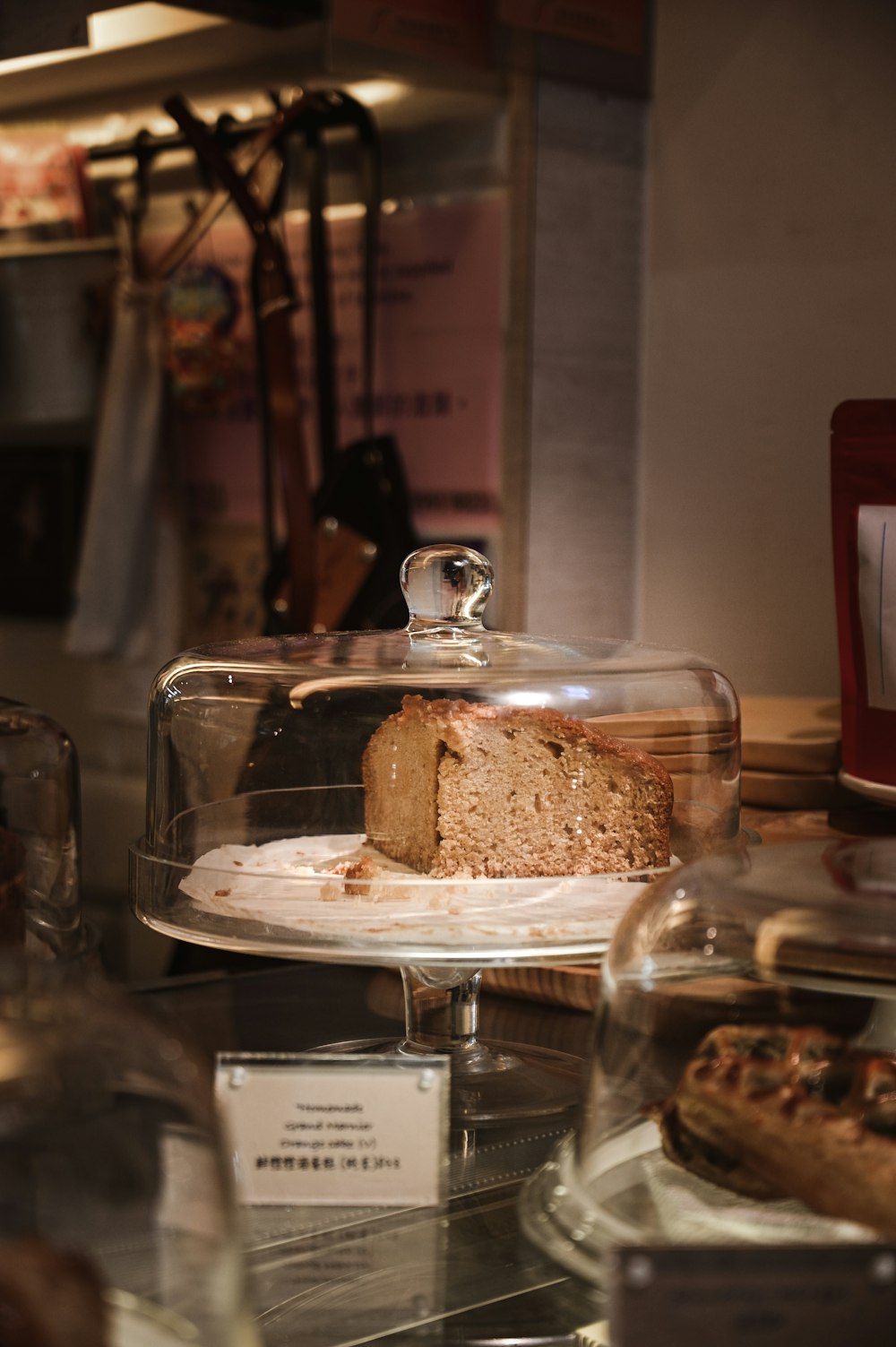 brown cake on clear glass cake stand