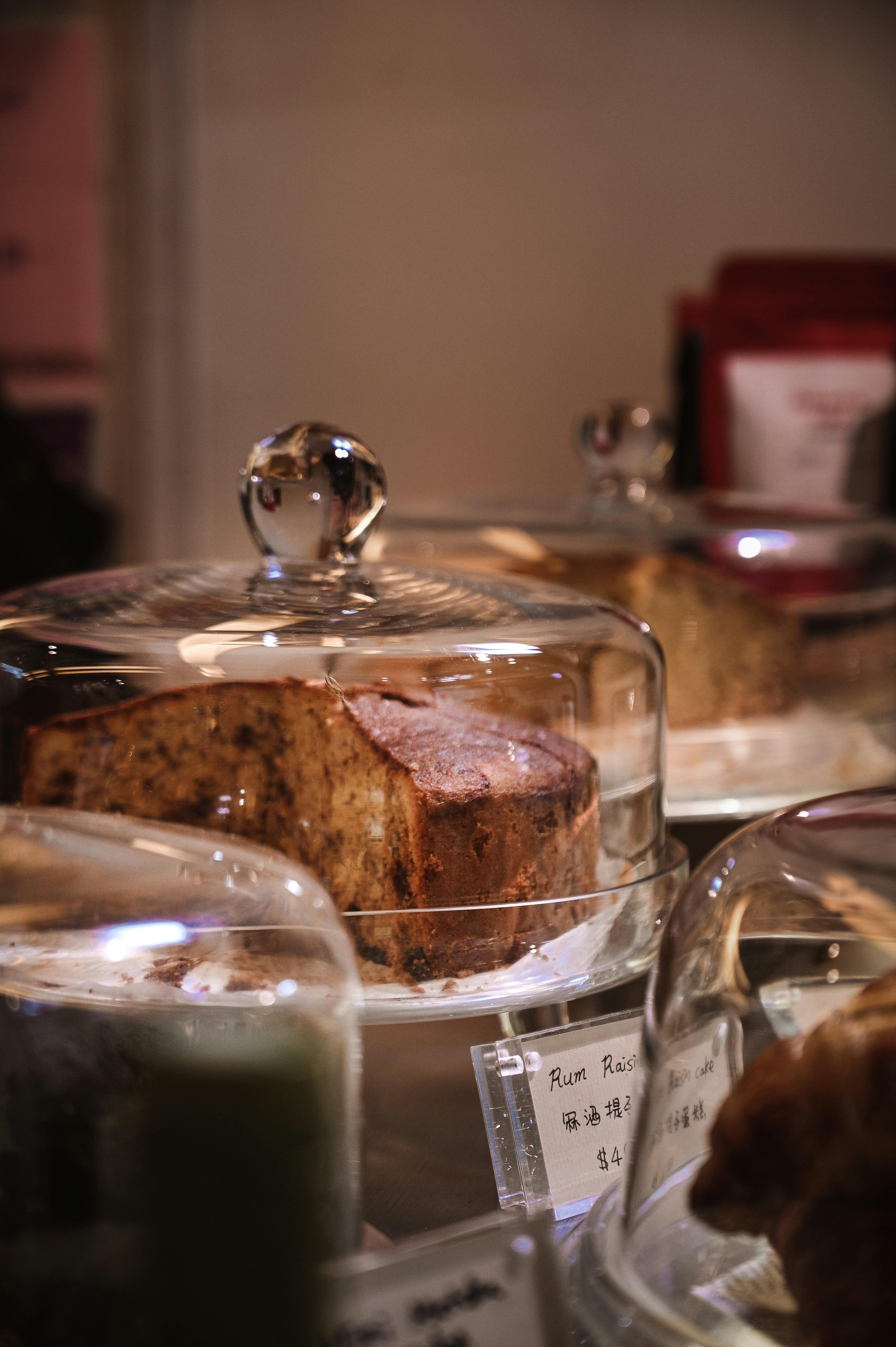 brown cake on clear glass cake stand