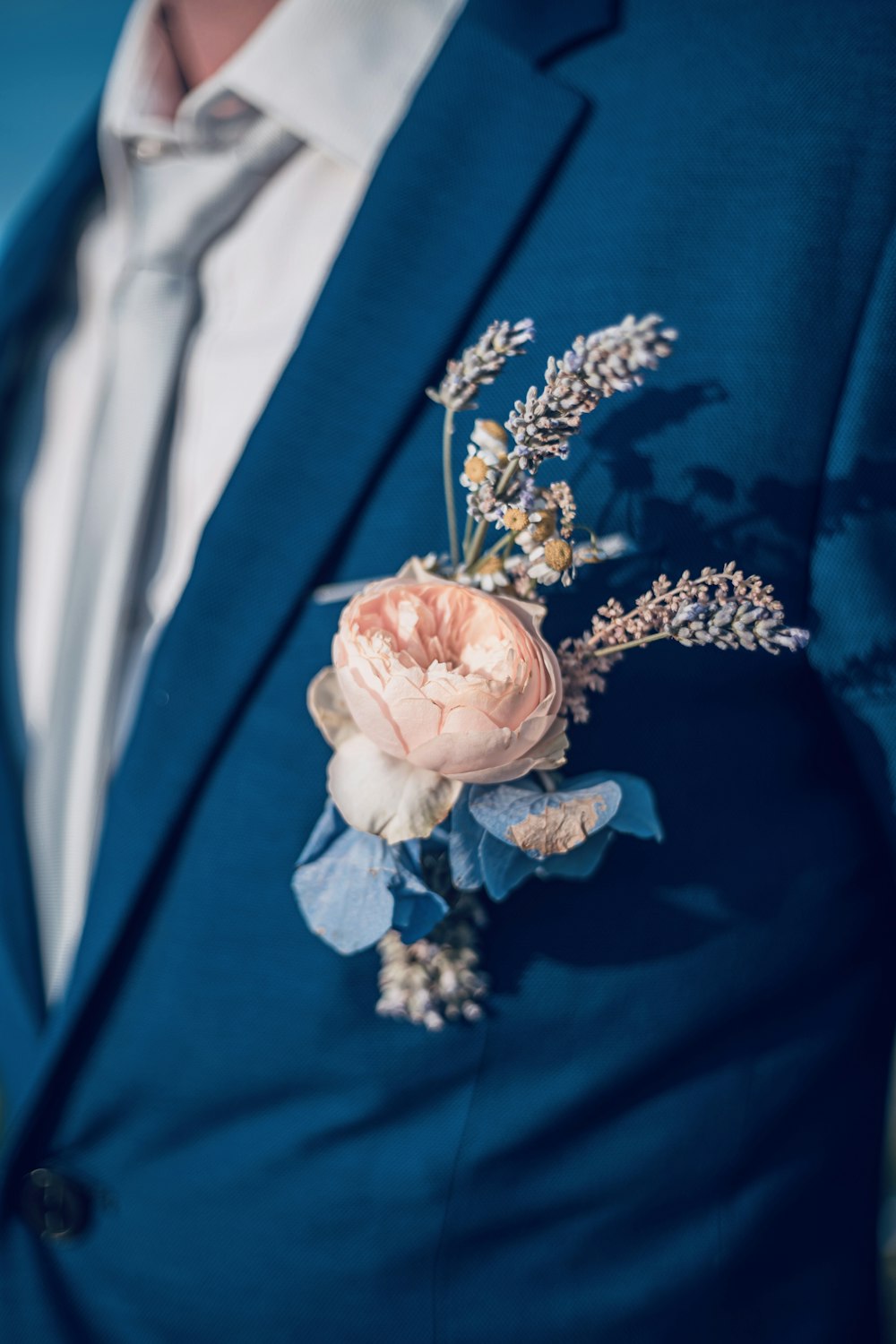 white and blue floral textile