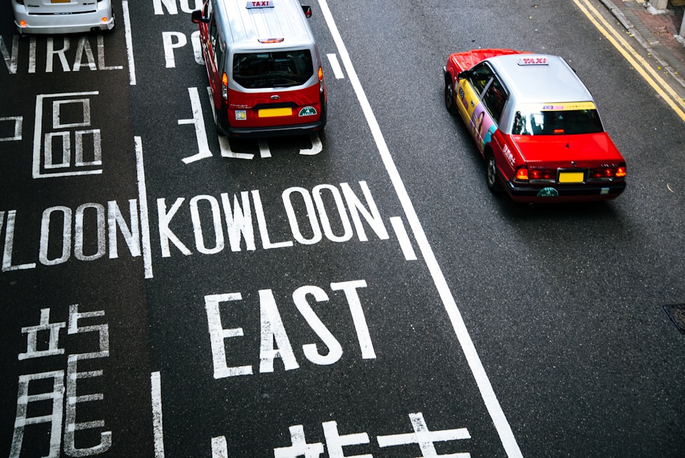 red car on road during daytime