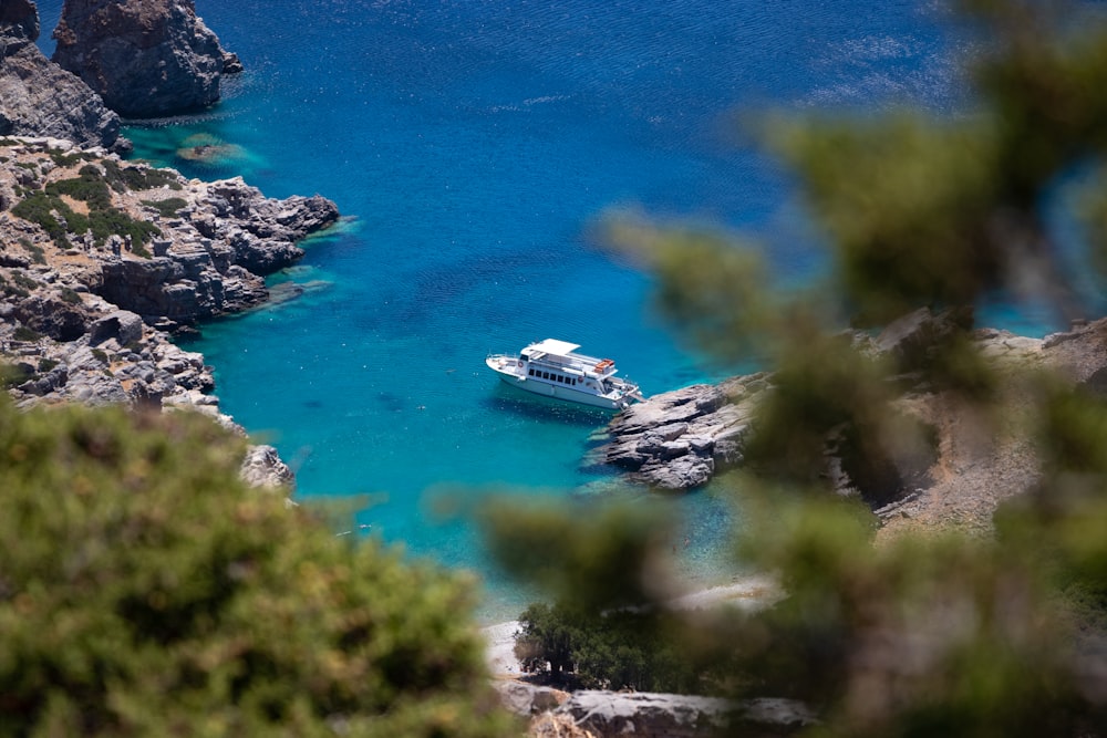 white cruise ship on blue sea during daytime