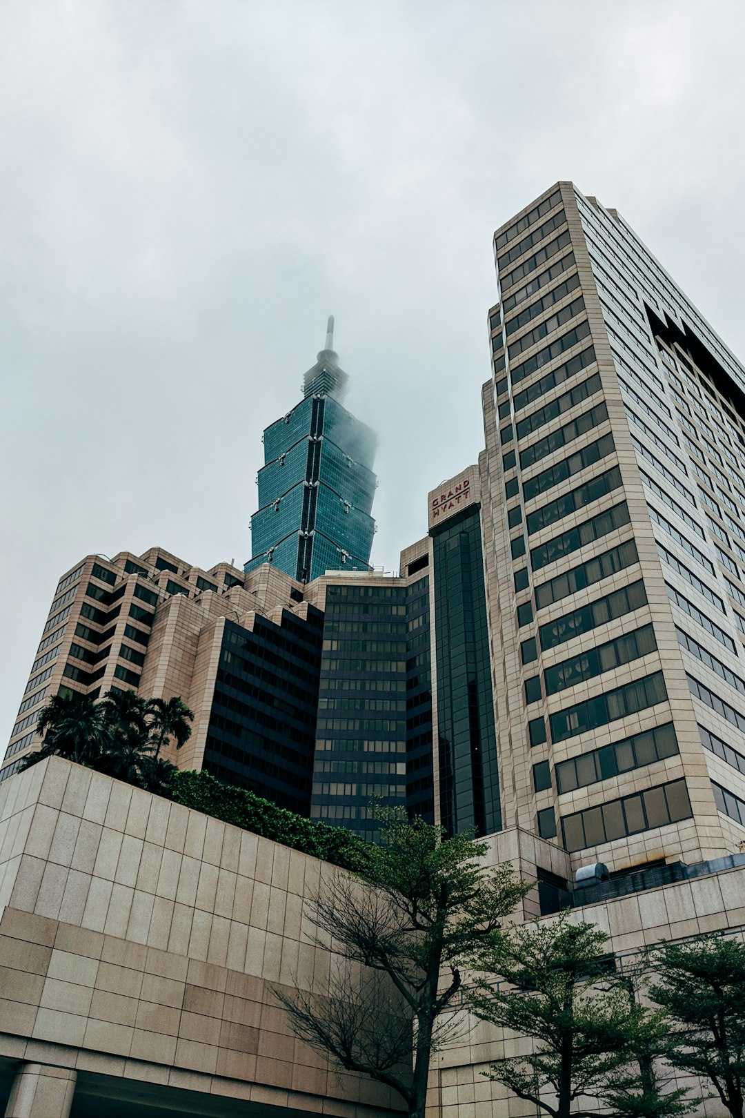 brown concrete building under white sky during daytime