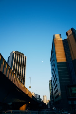 brown and white high rise buildings under blue sky during daytime
