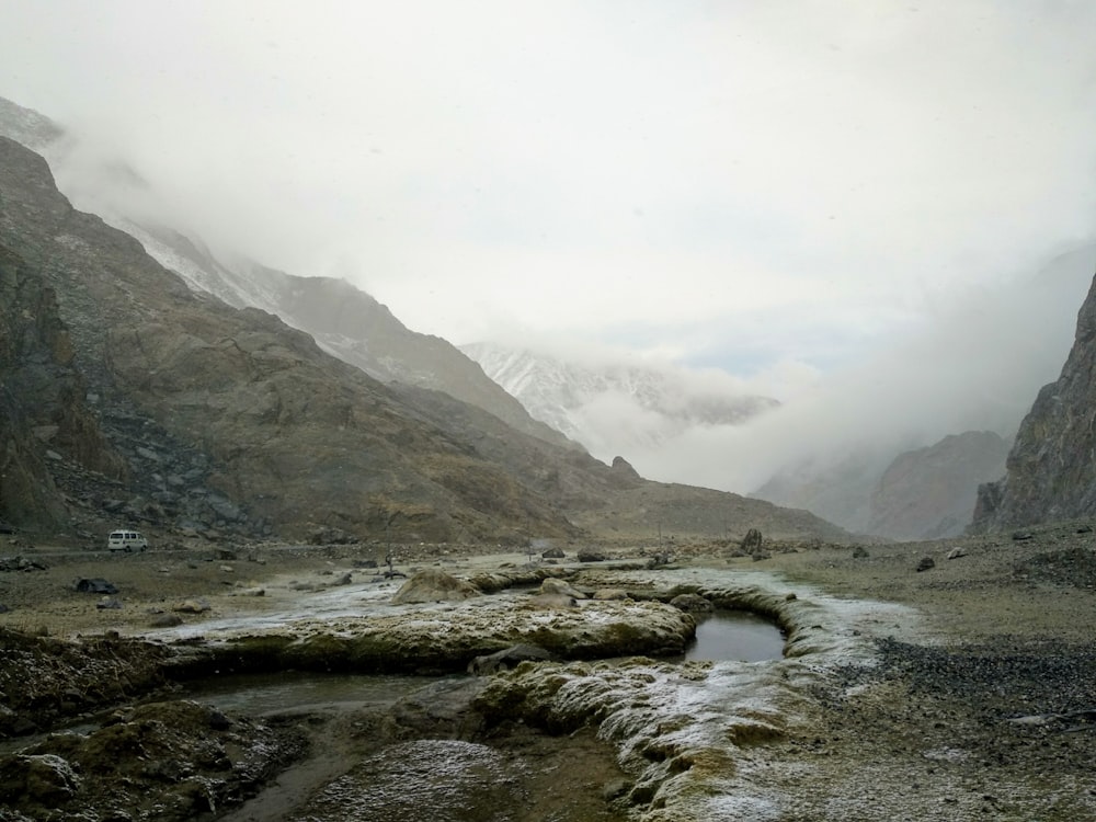 gray rocky mountain under white sky during daytime