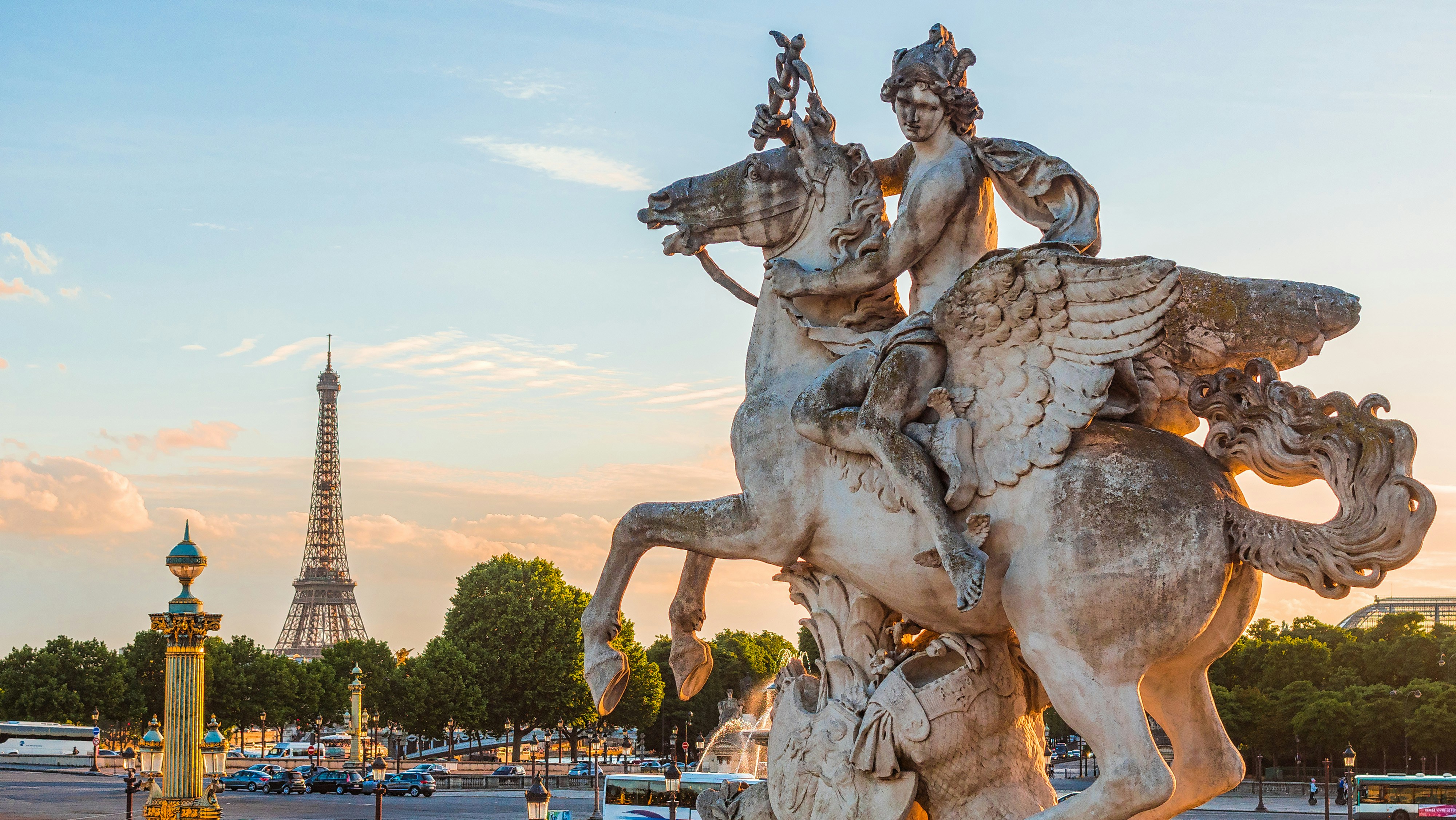 man riding horse statue during sunset, Sunset at the Place de la Concorde in Paris, with a view of the fountains and the Eiffel Tower.
