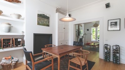 brown wooden table and chairs