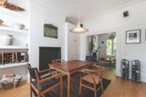 brown wooden table and chairs