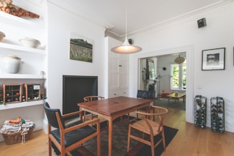 brown wooden table and chairs