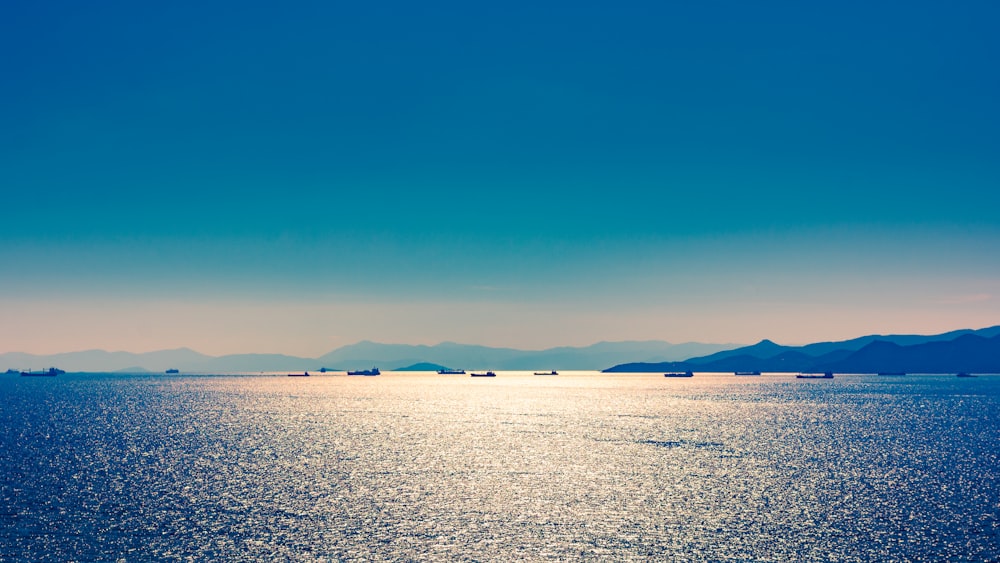 body of water under blue sky during daytime