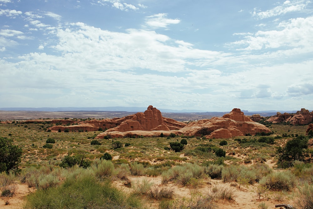 brown rock formation under blue sky during daytime