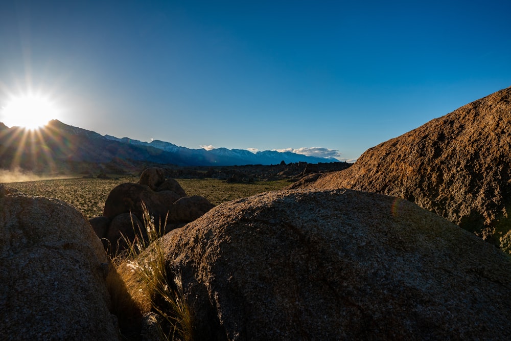 brown rock formation under blue sky during daytime