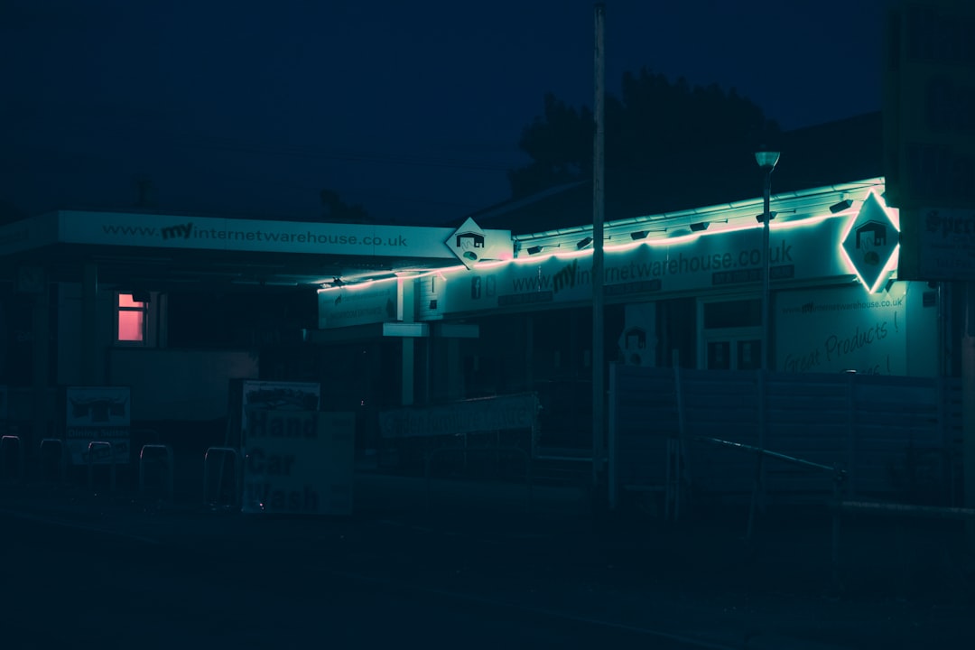 white and blue train on rail tracks