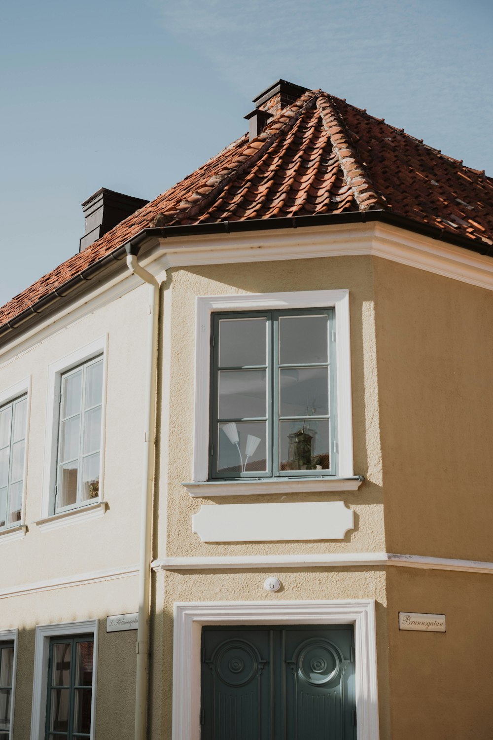 white and brown concrete house