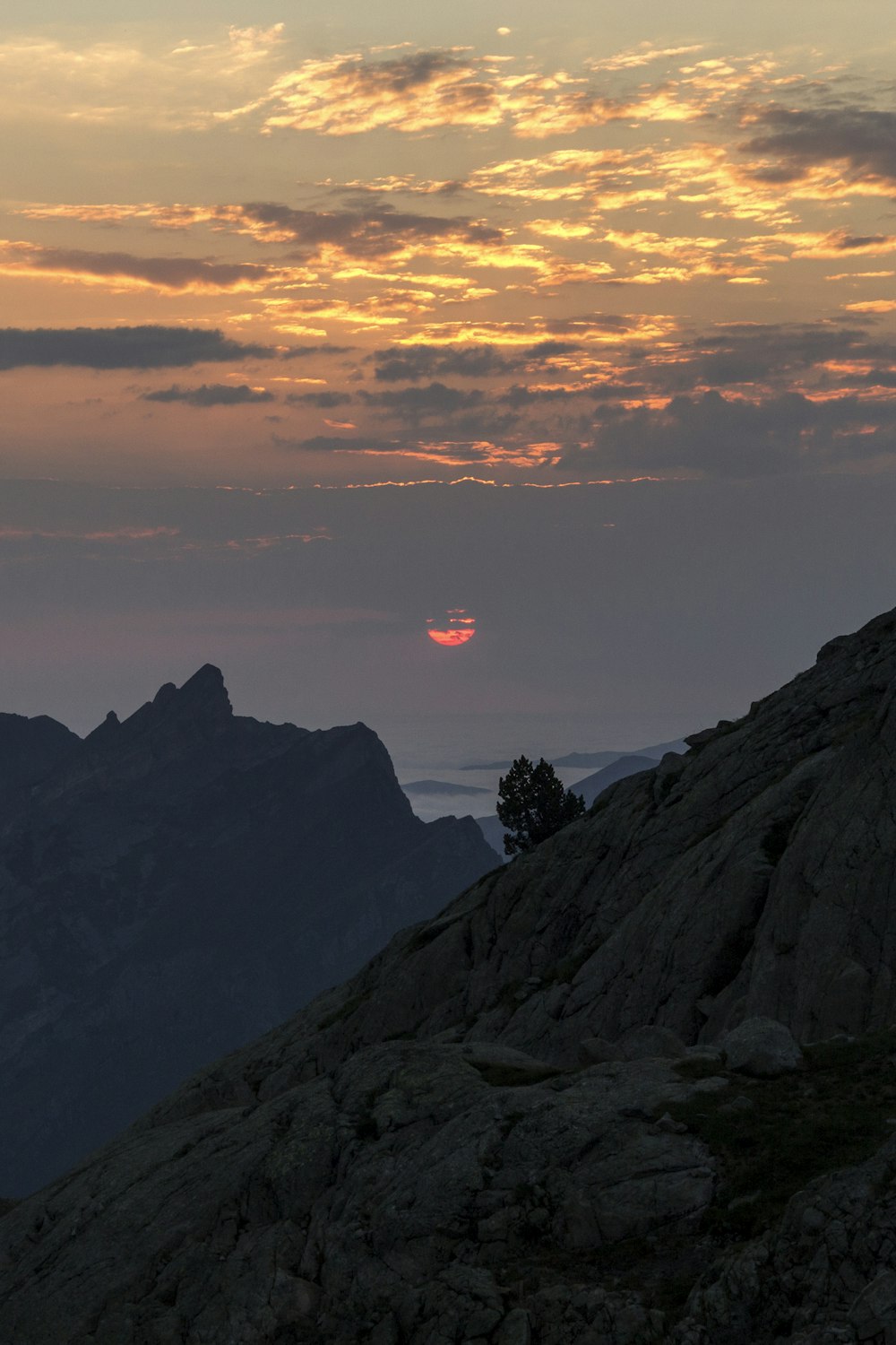 silhouette of mountain during sunset