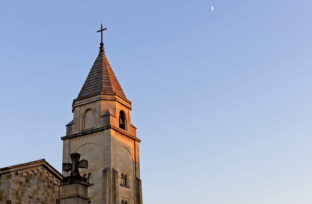 brown concrete church under blue sky during daytime